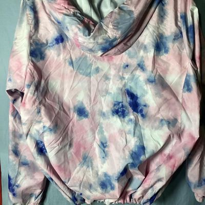Sale Photo Thumbnail #95: New Balance hooded windbreaker/lightweight jacket featuring a pink, blue, and white tie-dye watercolor pattern. Includes full front zipper, zippered side pockets, mesh lining, hooded drawstrings, and an adjustable cinch hemline. Size XL. Made in Vietnam. 