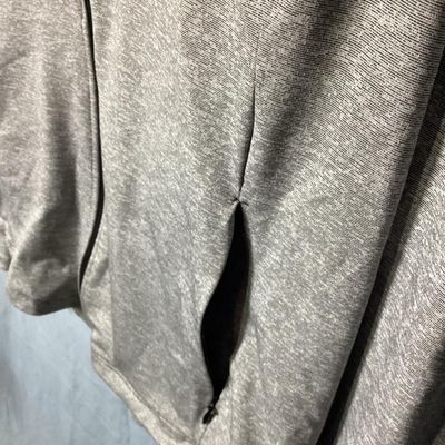 Sale Photo Thumbnail #101: Women's full-zip athletic workout jacket by Tek Gear Workout Gear. Heathered gray performance fabric with dark contrast stitching, full front zipper, high collar, and side zippered hand pockets. Size 1X (90% polyester, 10% spandex). Appears to be in very 