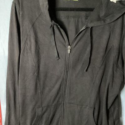Sale Photo Thumbnail #106: Xersion brand women's black full-zip hooded jacket/sweatshirt, size XL (semi fit). Features front pockets, drawstring hood, and ribbed trim. Lightly used condition with minimal wear. Approx. 28-29 inches in length.