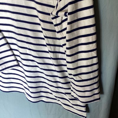 Sale Photo Thumbnail #131: Women's Quacker Factory by Jeanne Bice v-neck top featuring navy blue and white horizontal stripes with sequined American flag embellishments across the chest and shoulders. 3/4 length sleeves. Size XL. Made in China. In good pre-owned condition with no v