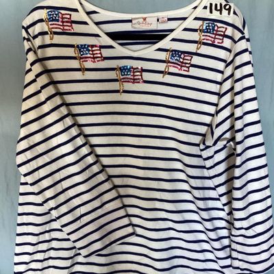 Sale Photo Thumbnail #129: Women's Quacker Factory by Jeanne Bice v-neck top featuring navy blue and white horizontal stripes with sequined American flag embellishments across the chest and shoulders. 3/4 length sleeves. Size XL. Made in China. In good pre-owned condition with no v