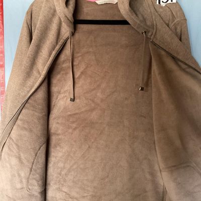 Sale Photo Thumbnail #144: An Isaac Mizrahi Live! women's full-zip fleece hooded sweatshirt/jacket in heathered tan/light brown. Features a drawstring hood with bright pink inner neck tape, front patch pockets, silver-tone hardware with engraved logo toggles, and side slits at the 