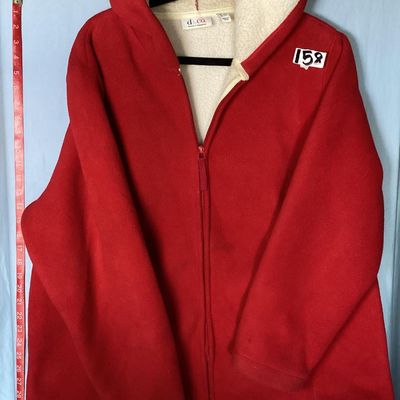 Sale Photo Thumbnail #182: Red hooded fleece jacket by Denim & Co. (d & co.), featuring a soft cream-colored sherpa/fleece lining, full zip closure, front side pockets, and an attached hood. 

- Brand: Denim & Co.
- Size: US 1X (UK 2XL, DE XL, IT 2XL, FR XXL)
- Color: Red with Off-