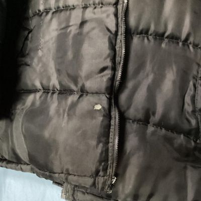 Sale Photo Thumbnail #195: Men's Phat Farm Classics hooded puffer jacket in black, size XL. Features a full zip front, detachable or adjustable hood, embroidered logo crest on the left chest, and subtle logo pattern printed across the shell fabric. Condition shows light wear, inclu