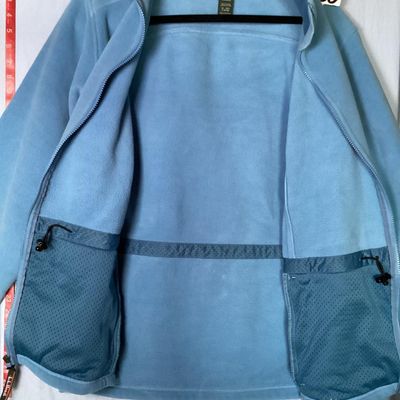 Sale Photo Thumbnail #204: L.L. Bean women's full-zip fleece jacket in light blue. Features front zippered pockets, high collar, interior cinch waist adjustment, and branded zipper pull. 

- Brand: L.L. Bean
- Size: Women's XL - Regular
- Material: 100% Polyester
- Color: Light Blu