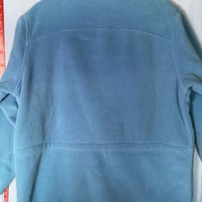 Sale Photo Thumbnail #203: L.L. Bean women's full-zip fleece jacket in light blue. Features front zippered pockets, high collar, interior cinch waist adjustment, and branded zipper pull. 

- Brand: L.L. Bean
- Size: Women's XL - Regular
- Material: 100% Polyester
- Color: Light Blu