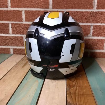 Sale Photo Thumbnail #236: HJC CL-X4 Fuel off-road/motocross motorcycle helmet in yellow, silver, black, and white graphics. Marked as Adult Large size with Advanced Ventilation System (AVS). Inner label indicates manufacturing date of September 2001. Features visor, chin guard ven