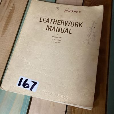 Sale Photo Thumbnail #245: Vintage instruction book titled 'Leatherwork Manual' by Al Stohlman, A. D. Patten, and J. A. Wilson. Softcover publication featuring detailed illustrations, diagrams, and step-by-step techniques for leather crafting, carving, tool usage, and assembling it