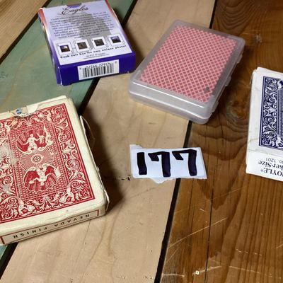 Sale Photo Thumbnail #296: Group of 4 playing card decks. Includes two Hoyle official poker size decks (one red Nevada Finish, one blue), one Eagles themed deck, and one promotional Paylocity deck in a clear plastic case. Boxes show some light wear and age.