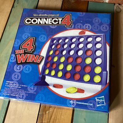 Sale Photo Thumbnail #302: Lot includes a classic Connect 4 board game by Hasbro Gaming, brand new in its original factory shrink wrap, and a wooden checkerboard/chessboard by Cardinal Industries. Both items are in clean condition; Connect 4 is unopened.