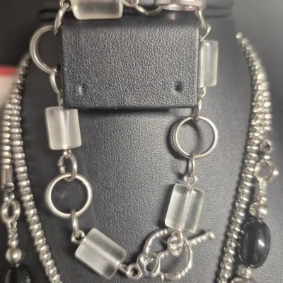 Sale Photo Thumbnail #271: Art Deco Victorian Revival Necklace & toggle bracelet
White metal pendant is covered with black set paste stones and center cabochon is black glass.
Chain comprised of black glass tube beads & Ornate silver bead / glass beads
total length 20" w/ 3"extensi