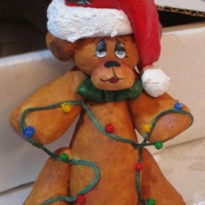 Sale Photo Thumbnail #380: 2 Santa bells, 4 Santas through the years, 1 Teddy bear with Santa hat, 1 girl with doll, See pictures