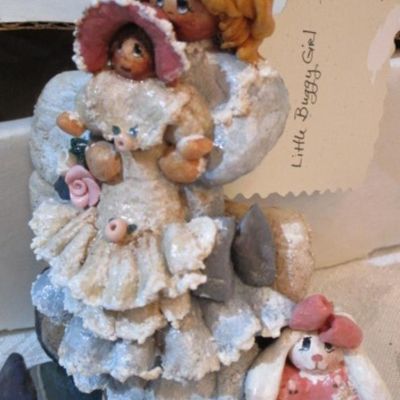 Sale Photo Thumbnail #382: 2 Santa bells, 4 Santas through the years, 1 Teddy bear with Santa hat, 1 girl with doll, See pictures