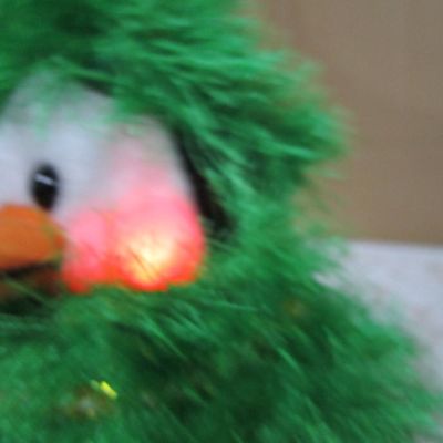 Sale Photo Thumbnail #429: Sings "We Wish You a Merry Christmas", Cheeks light up, Takes 3 AA batteries not included, See pictures