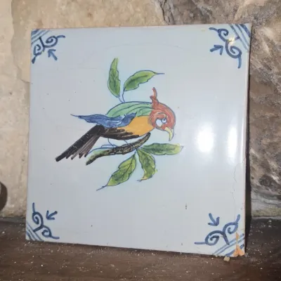 Sale Photo Thumbnail #118: Antique delft tile with polychrome bird th century