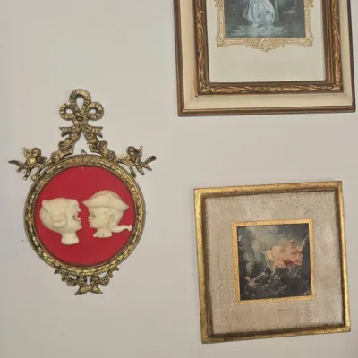 Sale Photo Thumbnail #130: Vintage blue boy and pinkie oval portrait plaques with cherub frame