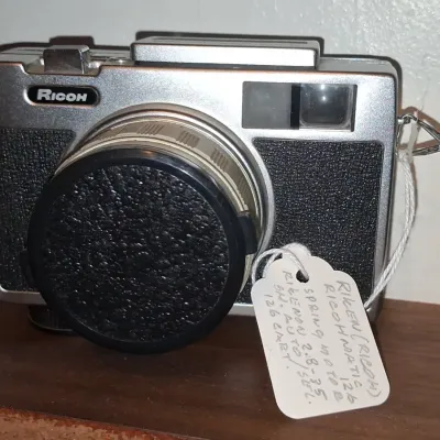 Sale Photo Thumbnail #234: Ricoh ricohmatic auto spring motor camera