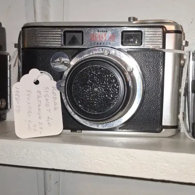 Sale Photo Thumbnail #264: Kodak signet camera with ektanar mm f or lens and synchro shutter