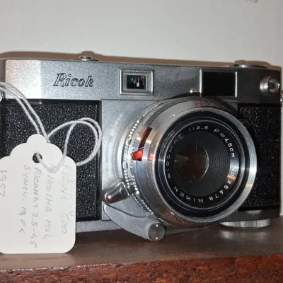 Sale Photo Thumbnail #300: Ricoh trigger wind rangefinder camera