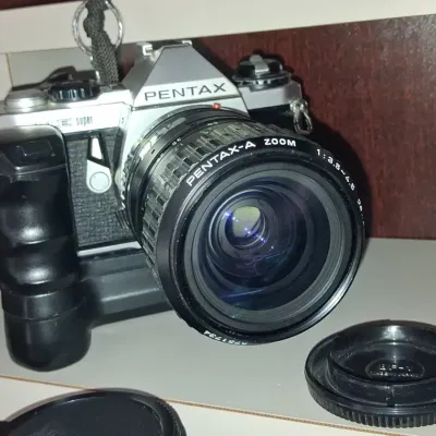 Sale Photo Thumbnail #333: Pentax me super slr camera with pentax a zoom lens