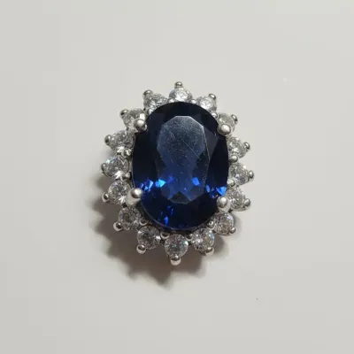 Sale Photo Thumbnail #365: Oval sapphire and cubic zirconia halo pendant