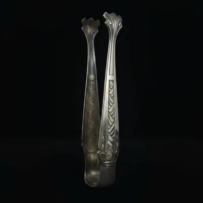 Sale Photo Thumbnail #498: Art nouveau silver plated sugar tongs