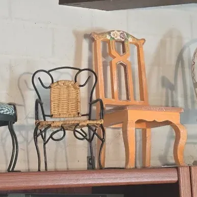 Sale Photo Thumbnail #506: Collection of miniature decorative chairs and rockers
