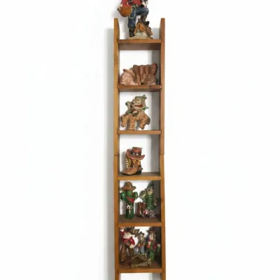 Sale Photo Thumbnail #592: Southwestern style decorative ladder shelf with resin figurines