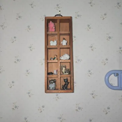 Sale Photo Thumbnail #607: Vintage miniature wooden display shelf with assorted figurines