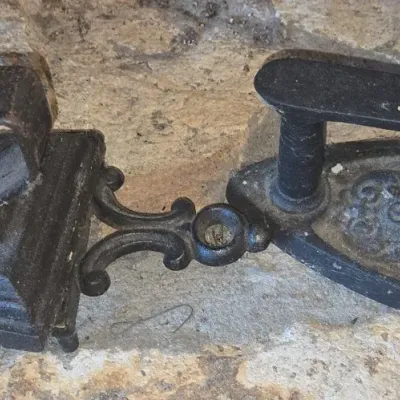 Sale Photo Thumbnail #617: Antique cast iron sad iron with ornate trivet