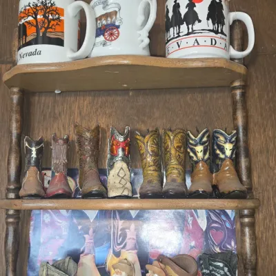 Sale Photo Thumbnail #632: Collection of miniature decorative cowboy boot figurines