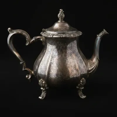 Sale Photo Thumbnail #719: Wm rogers silver plated teapot