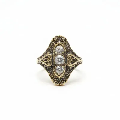 Sale Photo Thumbnail #740: Art deco style three stone filigree ring with marcasite accents