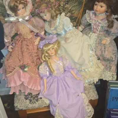 Sale Photo Thumbnail #749: Collection of four victorian style porcelain dolls