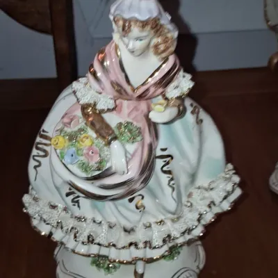 Sale Photo Thumbnail #756: Dresden porcelain lady figurine with flower basket