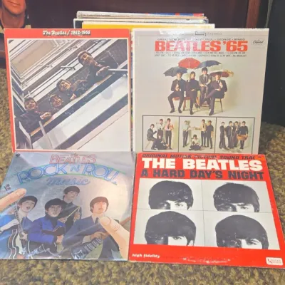 Sale Photo Thumbnail #797: Collection of four vintage beatles vinyl records