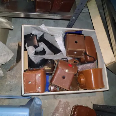 Sale Photo Thumbnail #800: Collection of vintage argus cameras and leather cases