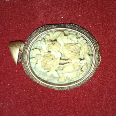 Sale Photo Thumbnail #819: Vintage carved floral brooch or pendant in gilt metal setting