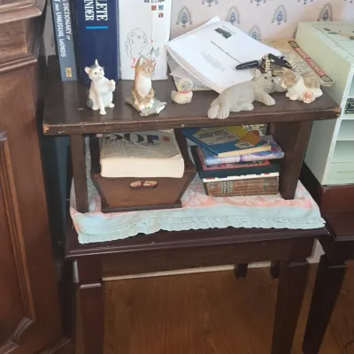 Sale Photo Thumbnail #829: Vintage wooden two tiered side table with cat figurines and books