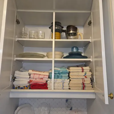Sale Photo Thumbnail #836: Assorted kitchen cabinet contents with white cabinet