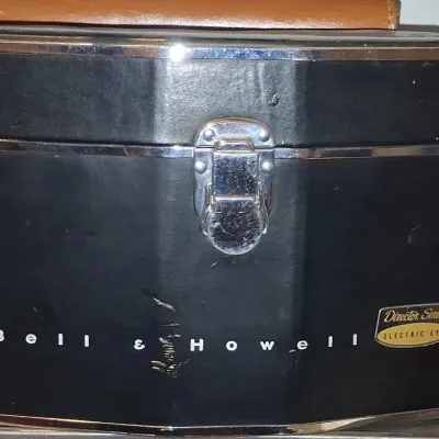 Sale Photo Thumbnail #838: Bell howell director series electric eye mm movie camera