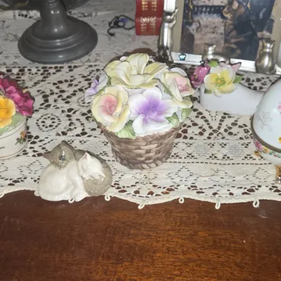 Sale Photo Thumbnail #850: Collection of vintage porcelain floral arrangements and figurines