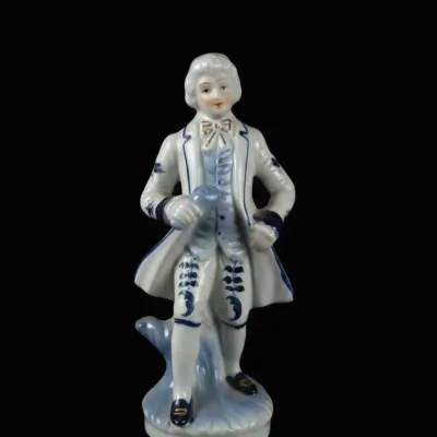 Sale Photo Thumbnail #872: Vintage blue and white porcelain gentleman figurine