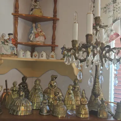 Sale Photo Thumbnail #897: Collection of vintage brass figural bells