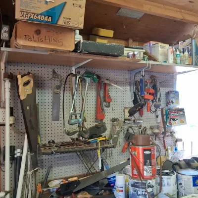 Sale Photo Thumbnail #930: Assorted vintage hand tools workshop supplies and pegboard system
