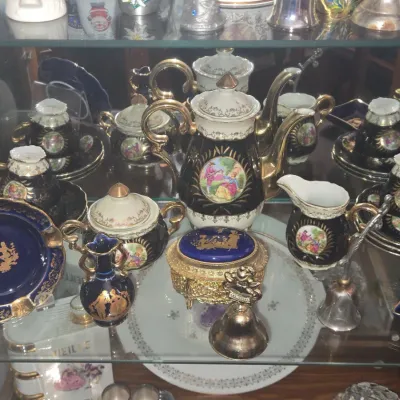 Sale Photo Thumbnail #935: Cobalt blue porcelain tea set with fragonard courting scenes