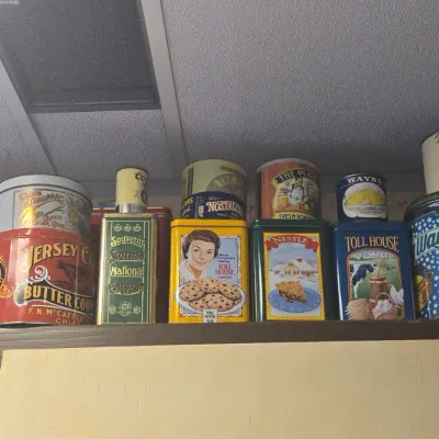Sale Photo Thumbnail #945: Collection of vintage advertising and commemorative tins
