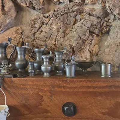 Sale Photo Thumbnail #950: Collection of vintage pewter jugs ewers and tableware