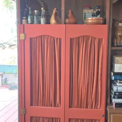 Sale Photo Thumbnail #954: Custom painted media cabinet with fabric inserts
