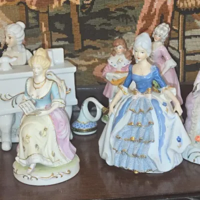 Sale Photo Thumbnail #979: Collection of dresden lace porcelain figurines